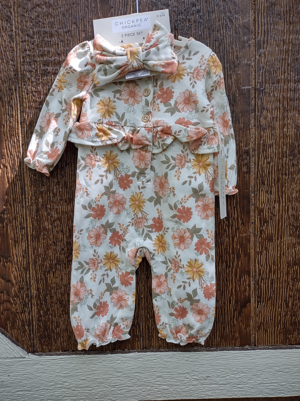 chick pea Cream Floral Baby Romper with Peach Accents 3-6M